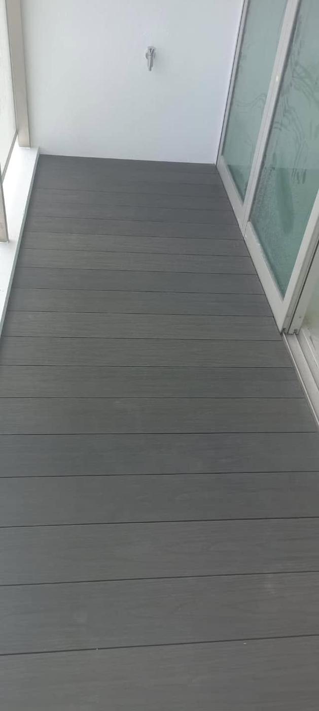 Grey WPC balcony after cleaning